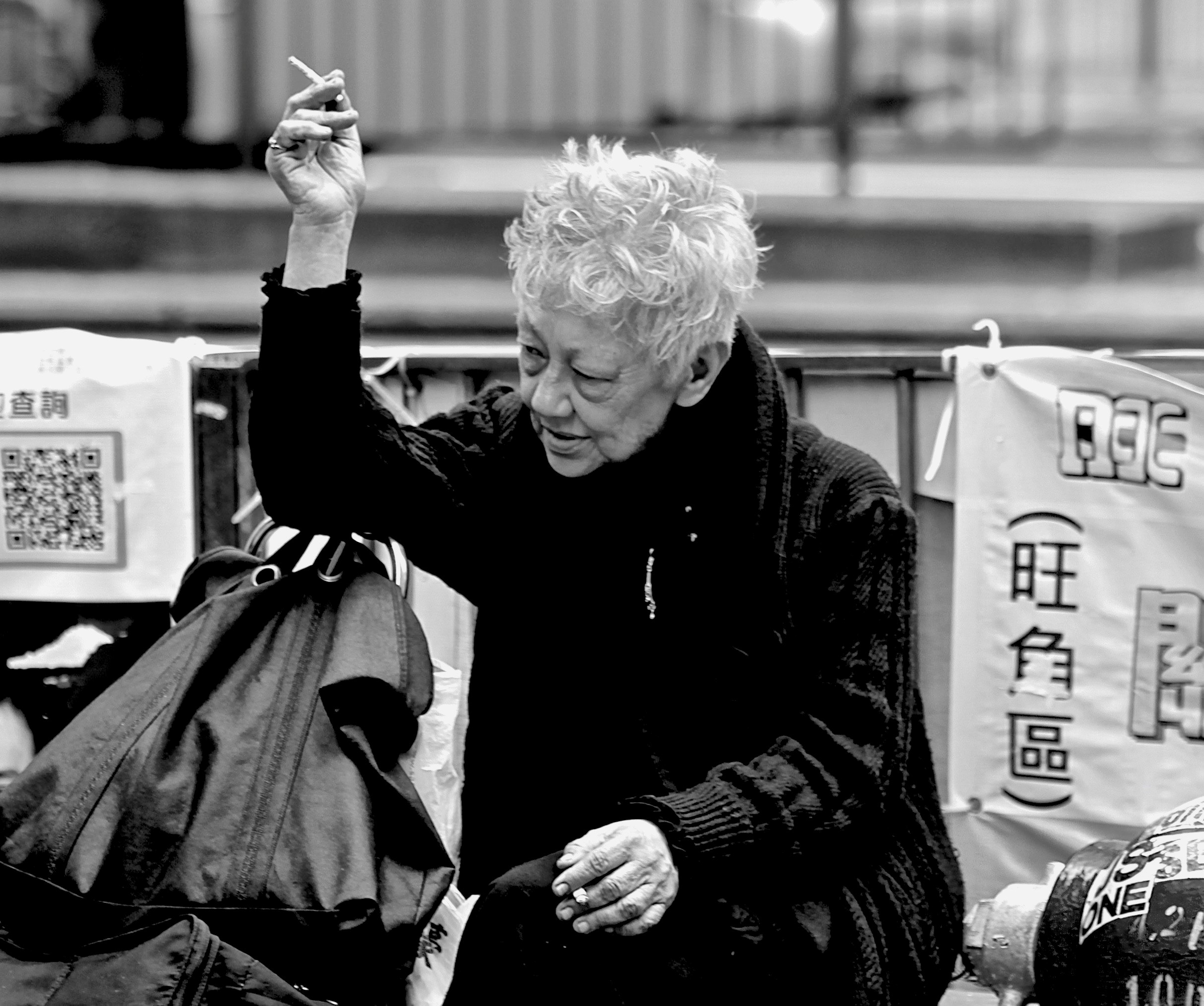 Two cigarettes. Mong Kok, Hong Kong, 2015